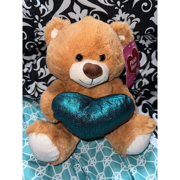 Plush valentines teddy bear holding a blue heart - Picture 1 of 10